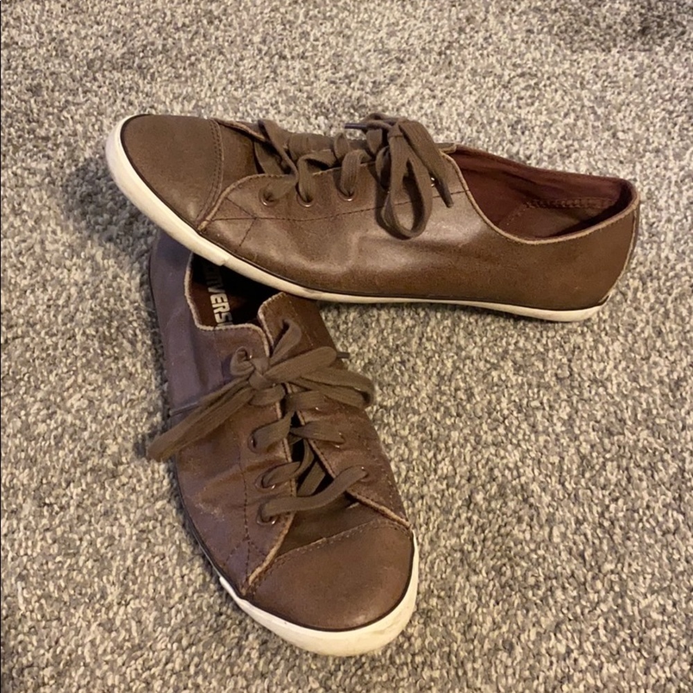 Brown leather converse